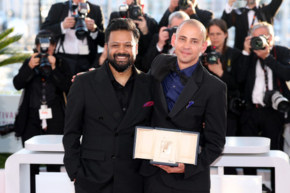 Adnan Al Rajeev and Tawfeek Barhom pose with the Palme d’Or for Short Film © Daniele Venturelli / WireImage